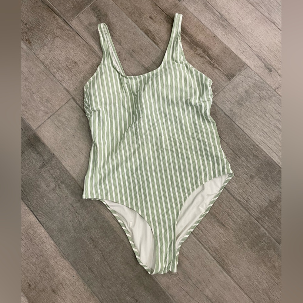green and white striped swim suit